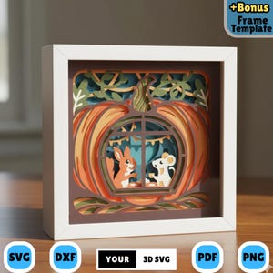 May include: A framed layered paper art piece with a pumpkin design, featuring a squirrel and mouse. The pumpkin is orange, with green and blue accents. The text "+Bonus Frame Template" is in the top right corner. The bottom has the text "SVG", "DXF", "YOUR 3D SVG", "PDF", and "PNG".