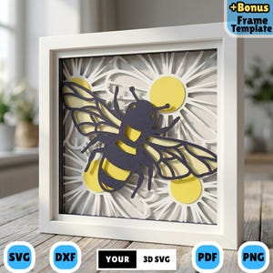 Può includere: Un'opera d'arte in carta 3D incorniciata con un design a forma di ape. L'ape è nera e gialla, su uno sfondo di margherite bianche con centri gialli. La cornice è bianca e l'immagine include il testo "+Bonus Frame Template".