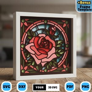 May include: A framed 3D layered art piece featuring a red rose design. The artwork is set against a light blue background within a circular pattern, framed in a white square. The frame includes the text "+Bonus Frame Template", and icons for SVG, DXF, PDF, and PNG file formats.