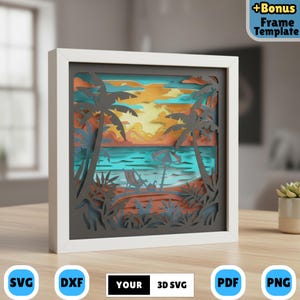 May include: A framed 3D paper art piece depicting a tropical beach scene. The artwork features layers of paper cutouts creating depth, with palm trees, ocean, and a sunset in shades of orange, blue, and gray. The frame is white, and the artwork includes the text "YOUR 3D SVG".