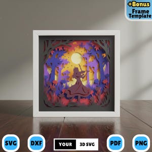 Puede incluir: Una obra de arte en papel cortado enmarcada que representa a una persona tocando el violín en un bosque. El diseño utiliza capas de púrpura, naranja y rojo, con una luna llena y árboles. El texto "YOUR 3D SVG" es visible.