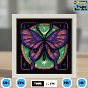 May include: A framed 3D SVG art piece featuring a layered butterfly design. The butterfly has purple and orange wings, set against a green and black background with stars and a crescent moon. The frame is white, and the image includes the text "YOUR 3D SVG".