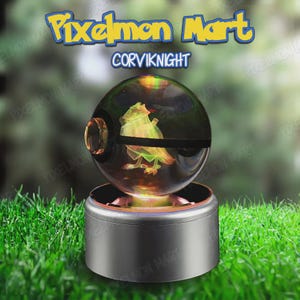 May include: A clear, spherical display featuring a holographic image of a bird-like creature. The display is labeled "Pixelmon Mart" and "Corviknight". The base is a silver cylinder, set on a bed of green grass.