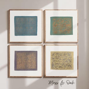 May include: Four square framed art prints arranged in a grid. The top left features a blue print with gold grid patterns. The top right shows a teal print with gold animal illustrations. The bottom left is a purple print with gold floral motifs. The bottom right is a yellow print with grey animal illustrations.