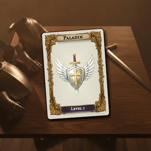 May include: A rectangular game card featuring the text Paladin at the top and Level 1 at the bottom. The center displays a silver shield with a gold cross, flanked by white wings and a sword. The card has an ornate gold border.