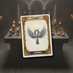 May include: A rectangular game card with an ornate gold border featuring the text CLERIC at the top and CANTRIP at the bottom. The center displays a silver ankh symbol with feathered wings and a glowing yellow halo above it on a cream background.