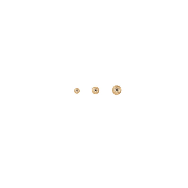 May include: Three gold-colored stud earrings of varying sizes. The smallest is a simple round stud, while the other two feature a sunburst design. The earrings are displayed against a white background.