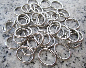 100 Qty. - 11mm x 13.5mm OD, 14g (1.4mm) Machine Cut Stainless Steel Oval Jump Rings OJR14-11-135