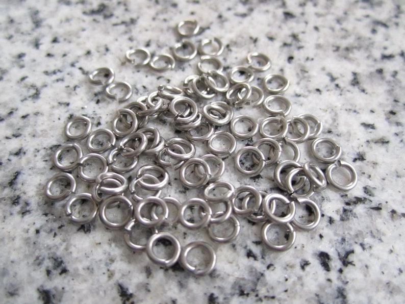 100 Qty. 4mm OD, 2.4mm ID, 20g .8mm Saw Cut Stainless Steel Jump Rings JR20-04 image 1