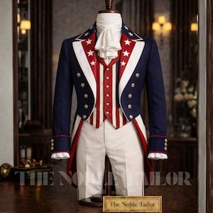 May include: A patriotic suit on a mannequin. The navy blue jacket has white star accents and red and white striped details. Gold buttons and a white ruffled shirt complete the look. The white trousers and vest with red and white stripes add to the theme.