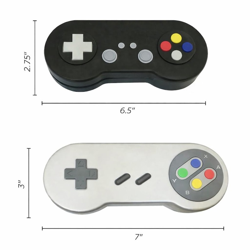 May include: Two game controller-shaped boxes. The black controller is 6.5 inches long and 2.75 inches wide. The silver controller is 7 inches long and 3 inches wide. Both have buttons and directional pads.