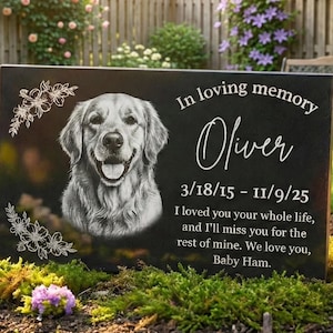 Personalized dog memorial granite stone with engraved photo and name, outdoor pet grave marker placed in garden remembrance setting.