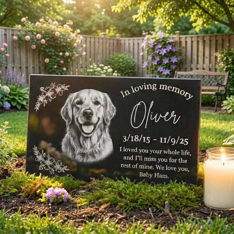 Personalized dog memorial granite stone with engraved photo and name, outdoor pet grave marker placed in garden remembrance setting.