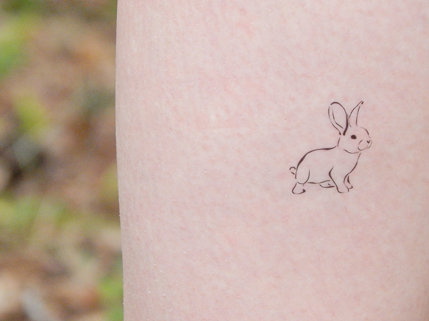 2. Delicate Bunny and Flower Tattoo Design - wide 7