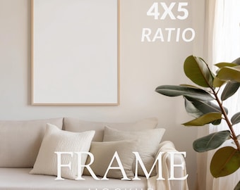 May include: A framed mockup with a 4x5 ratio, displayed above a beige sofa with decorative pillows. The frame has a light wood finish. The word "FRAME" and "MOCKUP" are displayed in white text. A plant with large green leaves is on the right.