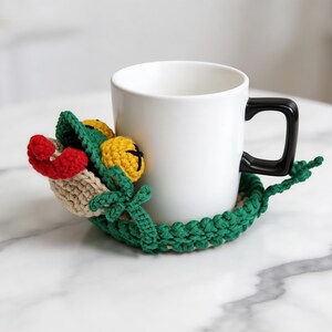 crochet lizard coaster pattern finished piece, handmade animal mug rug with tongue detail