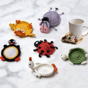 collection of animal coaster crochet patterns including fox duck goose penguin turtle and ladybug and donkey mug rugs