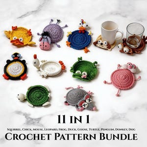 May include: A white ceramic mug with a black handle and the text "But First, Coffee" in a black, handwritten-style font. The mug is on a white surface.