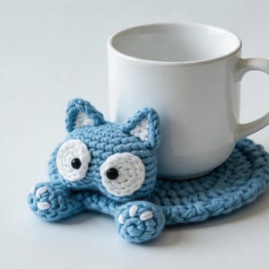 pop up crochet coaster with cup functional mug rug cute animal coaster in use handmade crochet