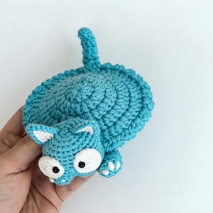 pop up cat crochet coaster in hand