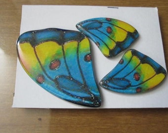 Focal, laminated wood and paper, blue / yellow / multicolored, (2) 37x25mm and (1) 55x38mm double-sided butterfly wing. 3-piece set.JD3