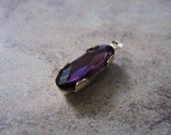 Drop, Swarovski® crystals and gold-plated brass, amethyst, 15x6mm faceted oval. JD166