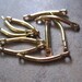 10 Links, gold-plated brass, 11x2mm curved flat end bar. . - JD211