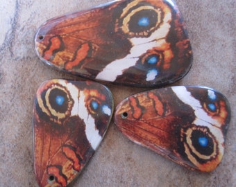 Focal, laminated hambabalud wood & paper, orange/brown/multicolored, (2) 39x25mm,(1) 50x31mm top-drilled double-sided btrfly wing. JD168