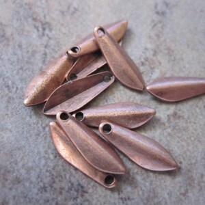 10 Drops, antique copper-plated brass, 11x4mm teardrop.JD210 image 1