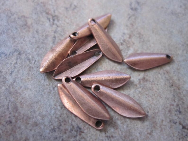 10 Drops, antique copper-plated brass, 11x4mm teardrop.JD210 image 1