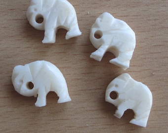 Little Bone Carved Elephants