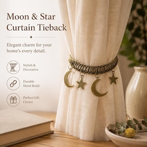 May include: A bronze-toned metal curtain tieback featuring a chain-link band adorned with dangling moon and star charms. The text on the image reads: Moon & Star Curtain Tieback, Elegant charm for your home's every detail, Stylish & Decorative, Durable Metal Build, Perfect Gift Choice.