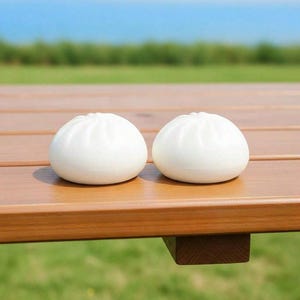 May include: A set of three ceramic mugs with a speckled, matte finish. The mugs are in shades of cream, light gray, and dark gray. Each mug has a simple, minimalist design, perfect for coffee or tea.