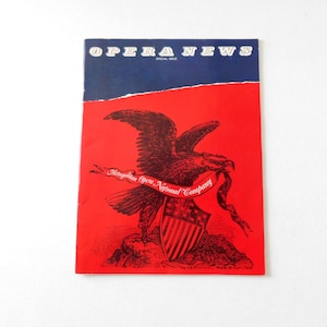 May include: A red and blue magazine cover with the title "Opera News" and a black and white illustration of an eagle holding a banner that reads "Metropolitan Opera National Company".