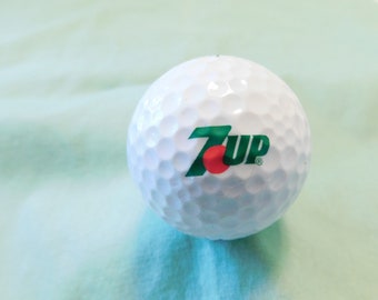 Vintage 7UP Golf Ball 2 Color Logo Green and Red Soda Advertising