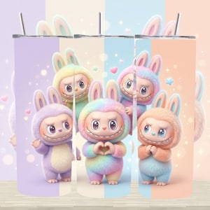May include: A set of five 20 oz. stainless steel tumblers featuring a cartoon bunny character in various pastel colors. Each tumbler has a different background color and a silver straw.