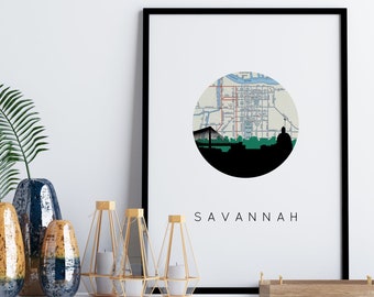 May include: A white cabinet with gold accents and three drawers. The cabinet is decorated with a black framed print of a map of Savannah, Georgia. The print is surrounded by a white mat and has the word "SAVANNAH" printed below the map.
