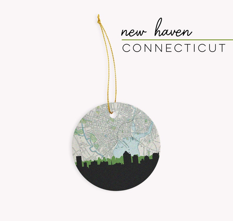 New Haven Connecticut Christmas ornament with the New Haven skyline and a New Haven Connecticut map. 100% ceramic and comes with a gold string. Available in other Connecticut cities. Designed by www.etsy.com/shop/paperfinchdesign