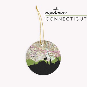 Newtown Connecticut Christmas ornament with the Newtown CT skyline and a Newtown Connecticut map. 100% ceramic and comes with a gold string. Available in other Connecticut cities. Designed by www.etsy.com/shop/paperfinchdesign