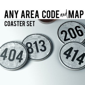 May include: Set of four round coasters featuring a map design with the area code printed in black on each coaster. The area codes are 404, 813, 206, and 414.