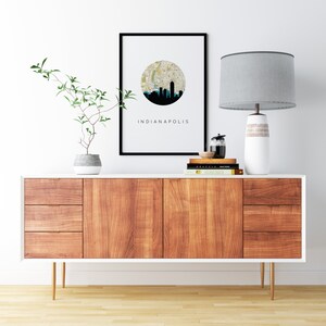 Indianapolis Indiana art print featuring the Indianapolis skyline and an Indianapolis Indiana city map. Available in several cities and frame options. Indianapolis Indiana shown in a black frame. Designed by www.etsy.com/shop/paperfinchdesign