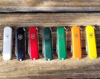 Używany wielofunkcyjny przyrząd Swiss Army Victorinox, 58 mm