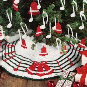 May include: A white crocheted Christmas tree skirt with green and white stripes. The skirt is decorated with red and white crocheted bells and white crocheted musical notes.
