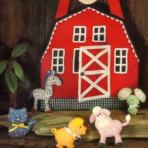 May include: A red fabric barn-shaped tote bag with a white trim and a white X-shaped door. The bag has a black and white checked trim at the bottom. The bag is decorated with a yellow felt chicken, a white felt sheep, a blue felt cat, a pink felt pig, and a green felt mouse.