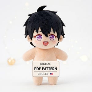 May include: A plush doll with short black hair, large purple eyes, and a smiling expression. The doll has a light skin tone and is holding a rectangular sign that reads DIGITAL PDF PATTERN ENGLISH with a small American flag icon included.