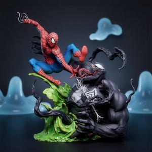 May include: A dynamic action figure set featuring Spider-Man in a red and blue suit leaping above a large, muscular black Venom figure with a long tongue, sharp teeth, and white spider emblem, all mounted on a textured green base.