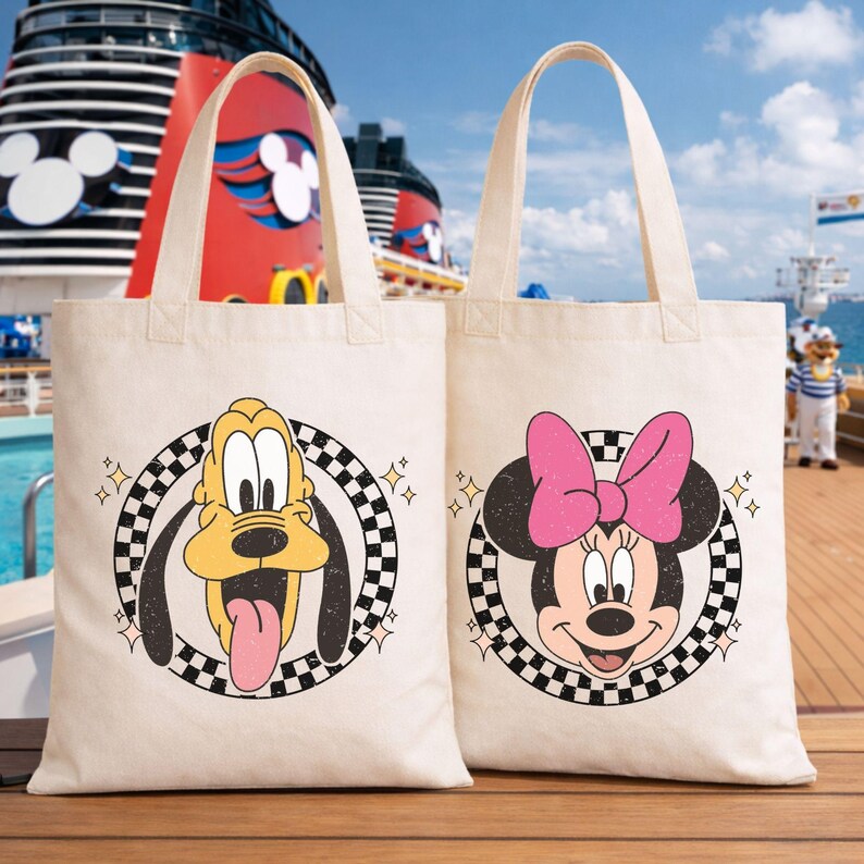 May include: Two cream canvas tote bags featuring Disney characters. One has Pluto with a yellow face and tongue, the other Minnie Mouse with a pink bow. Both have a black and white chequered circle design.