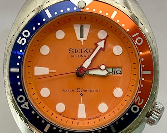 Vintage Seiko Automatic Diver Style Watch: Orange Dial, Day/Date Restored Rubber Strap