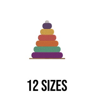 May include: A colorful stacking toy with a wooden base. The toy features rings in purple, teal, orange, yellow, and gray. The text "12 SIZES" is displayed below the toy.
