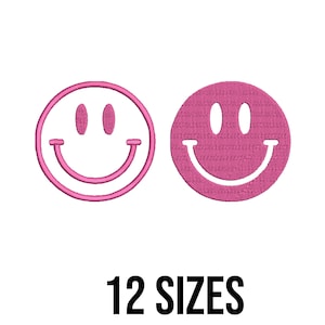 Könnte beinhalten: Zwei rosa Smiley-Designs auf weißem Hintergrund. Eines ist eine Umrisslinie, das andere ist gefüllt. Der Text "12 SIZES" steht darunter. Diese Designs eignen sich für Stickereien oder Bastelprojekte.